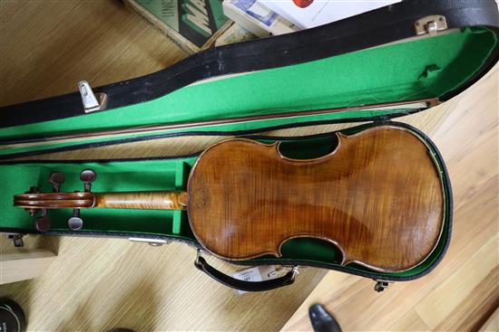 A 19th century (1822) single back violin by John Gough, who worked for Dearloves in Leeds, cased with two bows.